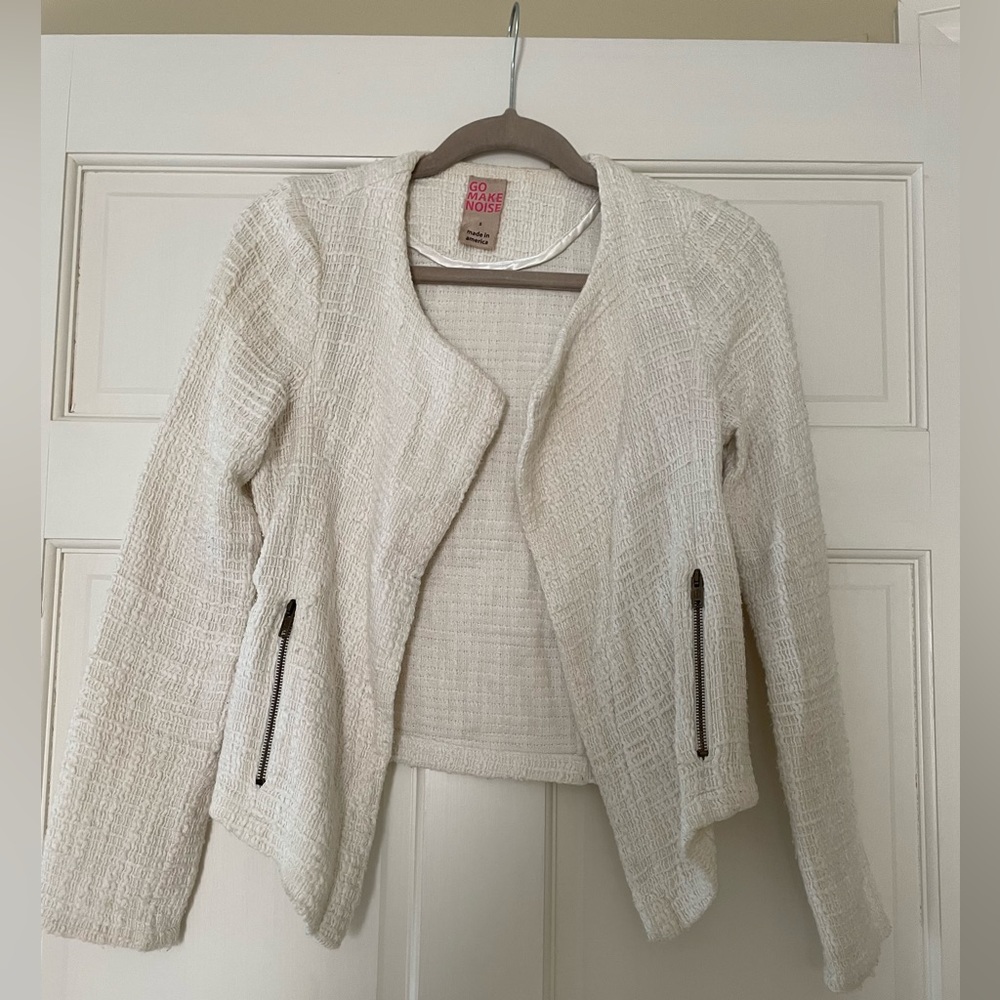 Go make noise white jacket